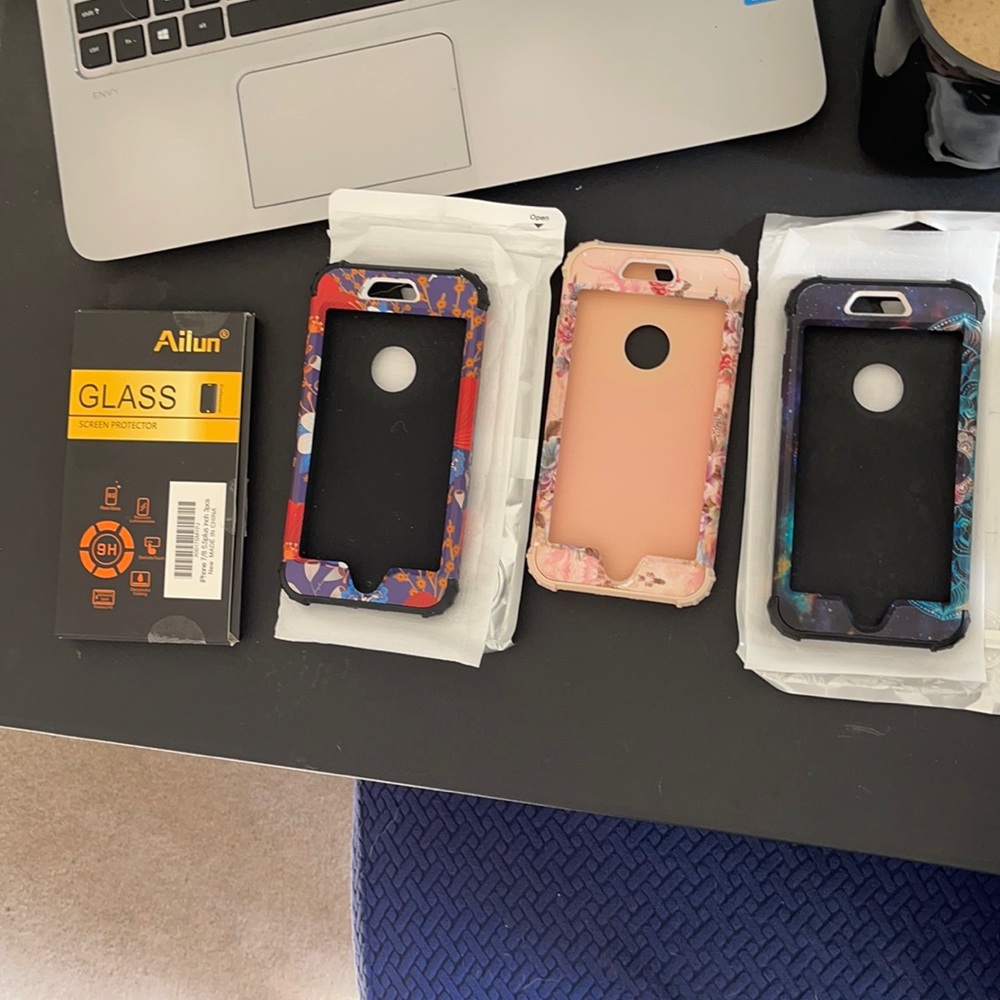 3 iPhone 6/7/8 Plus phone cases and 2 screen protectors